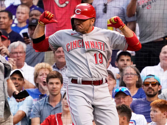 Jul 28, 2021; Chicago, Illinois, USA; Cincinnati Reds first baseman Joey Votto (19) gestures as he crosses home plate after hitting a home run against the Chicago Cubs during the second inning at Wrigley Field.